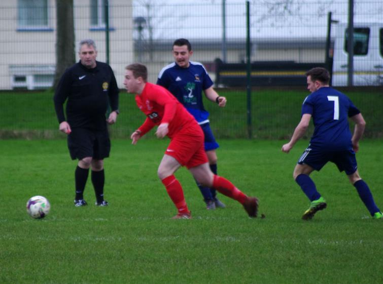 Luke Phillips in possession for Pennar Robins who lost at home against close rivals Lamphey